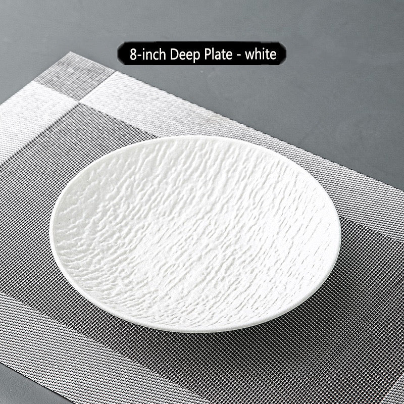 Stone-patterned ceramic bowls and plates