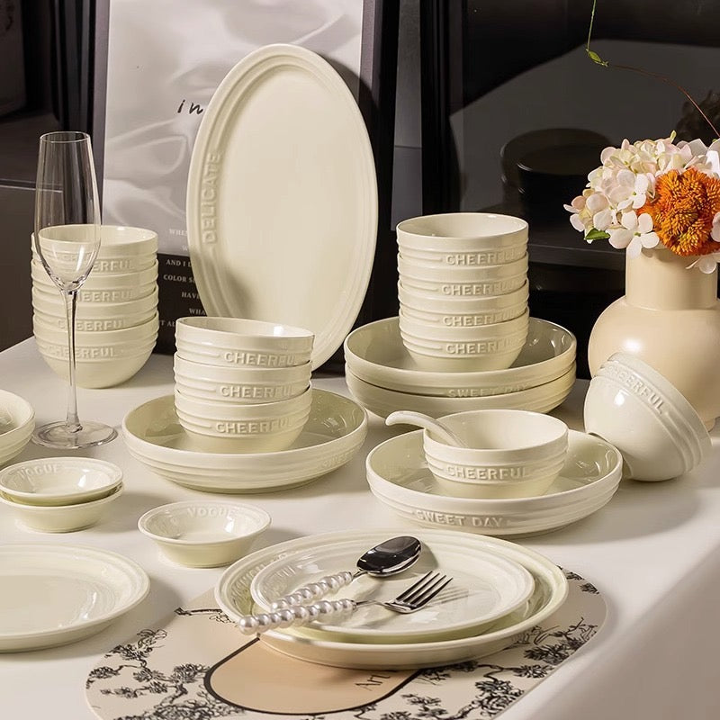 French Embossed 	Cream-Colored Ceramic Tableware